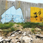 Banksy,_gandhi_graffiti_on_apartheid_wall